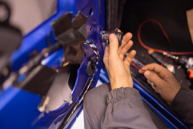 expert mechanic repairing car door systems